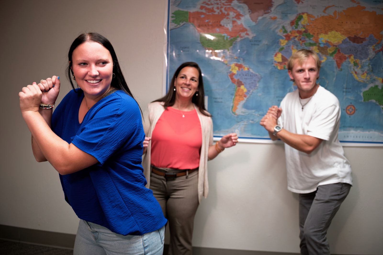 Students working with a sport psychology professor.